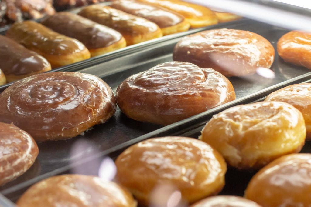 The morning case at The Donut Run — glazed, maple bars and old fashioned