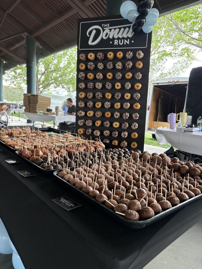 A donut wall set up at an event by The Donut Run in Utah